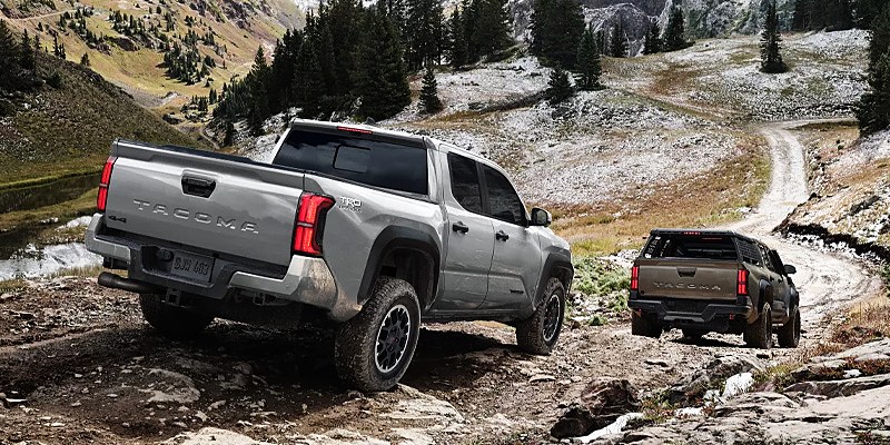 Placeholder photo: Tacoma TRD Off-Road climbing a trail, rear three-quarter view